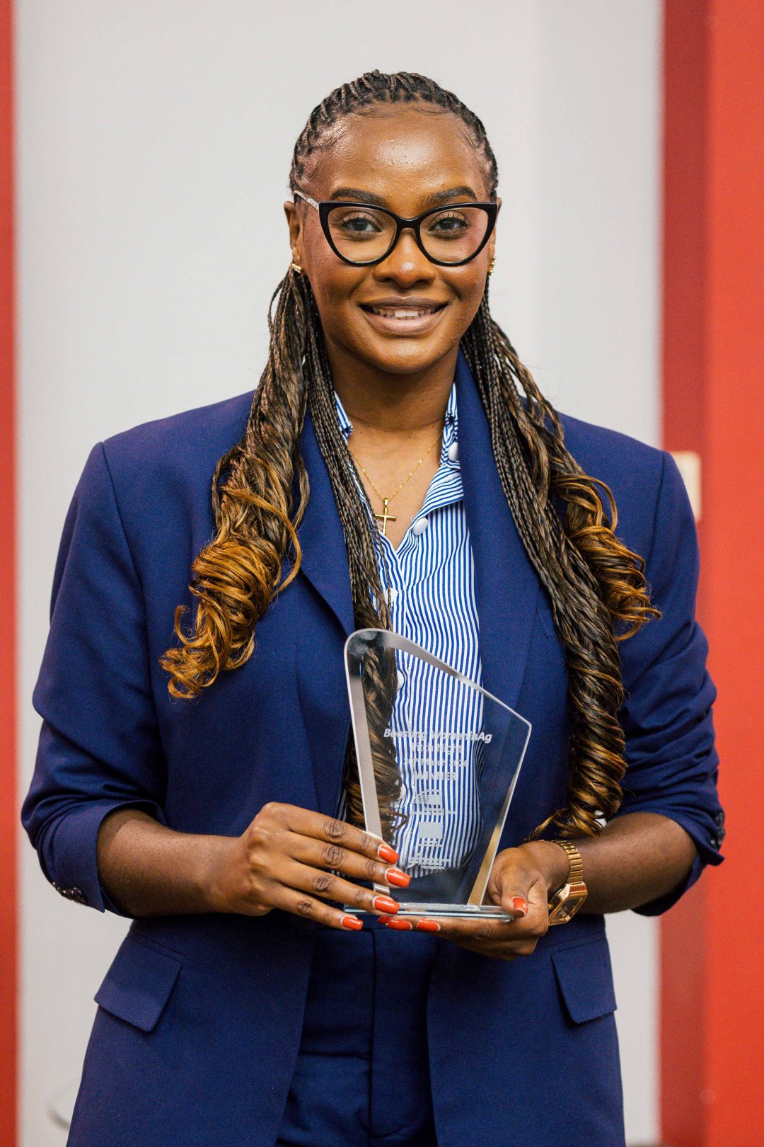 Holding the Boosting WomenInAg Pitch Night winner award